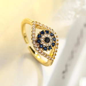 Gold plated evil eye open ring with blue and white cubic zirconia accents for women