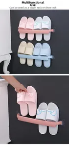Adhesive wall-mounted rack showing double-layer storage for slippers and towels