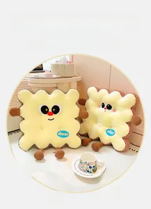 Close-up of plush cookie-shaped chair cushions with cute expressions and cheese star embroidery