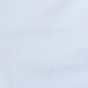 Macro shot of high-quality white twill fabric texture with fine diagonal weave patterns