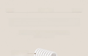 Detailed macro view of high-strength white metal hook featuring durable smooth coating