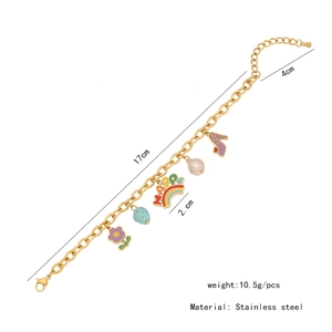 Detailed view of colorful charms on a golden stainless steel bracelet with sizing info