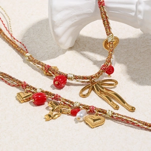 Handwoven 18K gold plated butterfly heart charms cord bracelet with pearls and red beads
