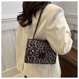 Chic leopard print crossbody bag with gold chain strap and metal buckle closure