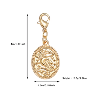 Macro view of gold tarot coin pendant with size dimensions and weight specifications