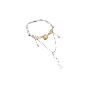 Elegant vintage starburst necklace with round pearls and waterdrop pendant on white background