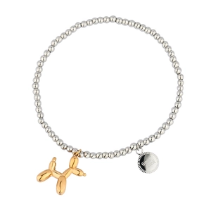 Detail of beaded bracelet featuring golden balloon dog charm and Good Luck engraved pendant