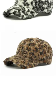 Detail of coffee brown leopard print baseball cap in soft faux teddy fleece material
