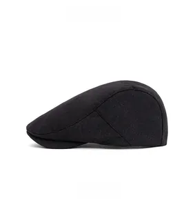 Side view of classic black flat cap with textured fabric and vintage casual design