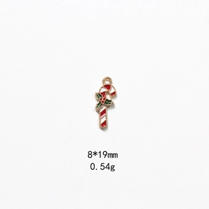 Detail of candy cane Christmas pendant charm with holly leaves and 8x19mm dimensions