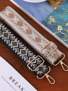 Adjustable wide woven guitar-style shoulder straps with geometric ethnic patterns