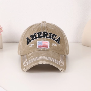 Distressed khaki America EST 1776 baseball cap with USA flag patch and vintage holes