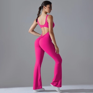 Detailed back view of rose pink flared yoga jumpsuit with scrunch butt lifting design