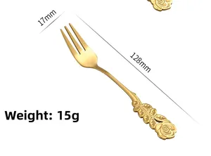 Detail of golden stainless steel rose dessert fork with dimensions 128mm and weight 15g