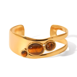 Golden titanium steel bangle featuring three inlaid tiger eye stones on white background