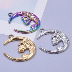 Three-piece stainless steel crescent moon skull pendants in rainbow, gold, and silver finishes