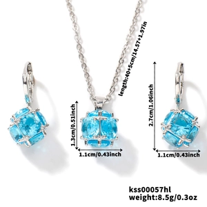 Detailed size chart for silver jewelry set with light blue faceted gemstones