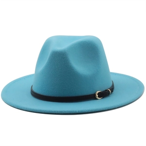 Detail of sky blue wool felt fedora featuring a black leather band and gold buckle