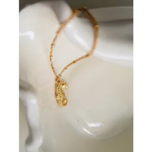 Elegant gold seahorse pendant necklace with fine chain made of durable stainless steel
