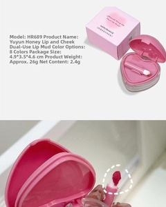 Macro shot of matte lip and cheek mud with heart-shaped case and applicator detail