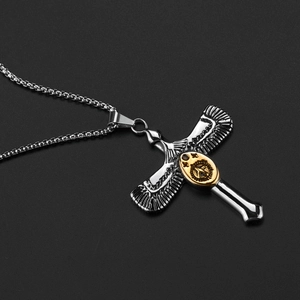 Retro stainless steel eagle cross pendant necklace with gold accents on black background