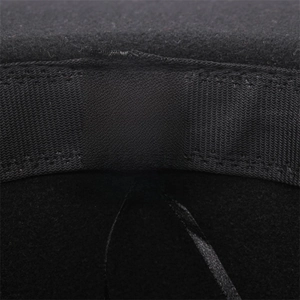 Detail view showing material tag with 65% cotton and 35% polyester on wool felt jazz hat