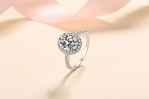 Macro detail of 925 sterling silver ring with brilliant-cut moissanite stone and halo