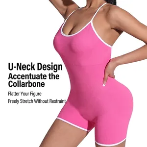 Pink ribbed yoga bodysuit with U-neck design and white trim in a slim-fit silhouette