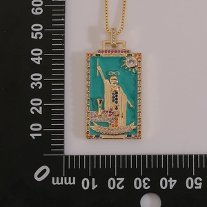 Detail view of Magician tarot card pendant measuring 32mm by 20mm on scale
