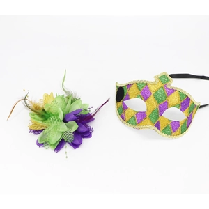 Close-up of Mardi Gras mask with purple green and gold sequins and matching feather flower