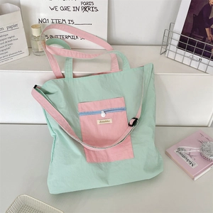 Detail of macaron canvas tote bag with front zipper pocket and Sozakka brand label