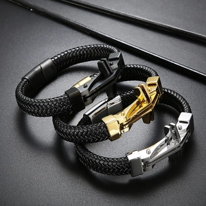 Men's braided leather bracelet with cross metal clasps in black, gold, and silver finishes