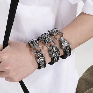 Herren Vintage Punk Lederarmband geflochten mit silbernen Totenkopf und Löwenkopf Motiven