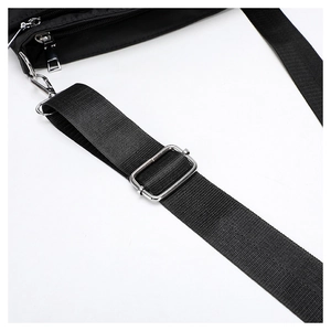 Detail of adjustable black nylon shoulder strap with silver metal swivel hooks and buckle