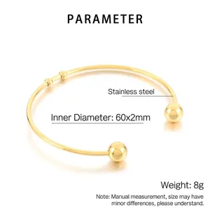Detail view of 18K gold plated stainless steel C-shaped cuff with 60x2mm inner diameter