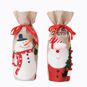 Linen Christmas wine bottle covers featuring Santa and Snowman with Merry Christmas text