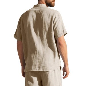 Detailed back view of a khaki linen summer shirt showing natural fabric texture and wrinkles