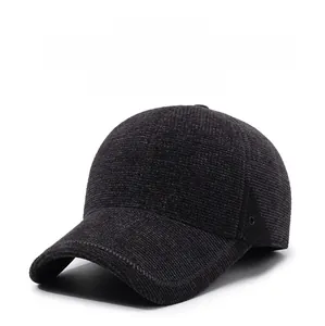 Close-up of thick textured fabric and ear flaps on a warm winter baseball cap for men