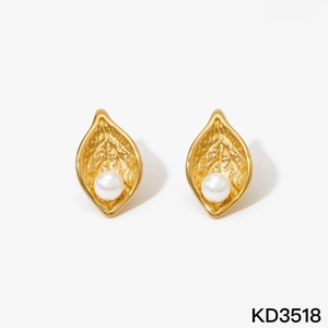 316L stainless steel gold leaf earrings with white pearls on a white background