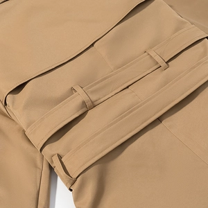 Chic khaki long trench coat for women featuring a double belt and classic storm flap