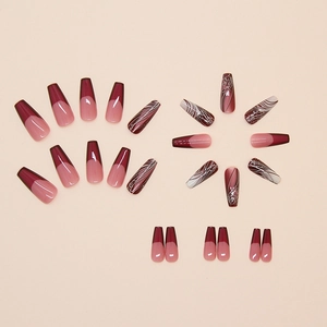 Short almond press-on nails with burgundy and pink French gradient and silver wavy lines