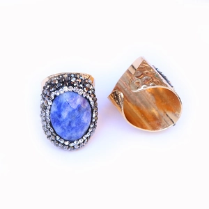 Adjustable gold plated brass ring featuring oval blue agate druzy stone and crystals