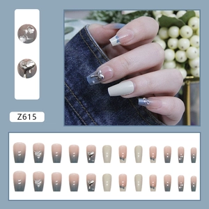 Dusty blue and cream gradient press-on nails with silver hearts and rhinestones
