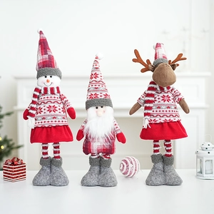 Three Christmas plush dolls featuring Santa, Snowman and Reindeer in red knit design
