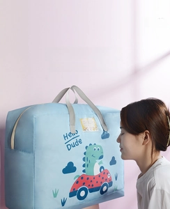 Detailed view of odorless fabric quilt storage bag with cute cartoon dinosaur print