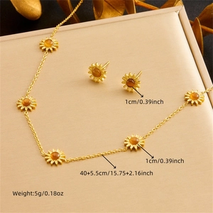 Golden stainless steel sunflower necklace and earring set with tiger eye stones