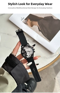 Macro shot of multifunctional watch dial with black silicone strap on marble surface