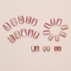 Detail of 24pcs pink cat eye and champagne gold glitter press-on nails in short square shape