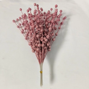 Detailed view of pink glitter artificial berries bunch for elegant holiday decoration