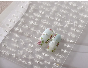 Adesivi per unghie farfalla 3D in rilievo bianco con perle su supporto trasparente